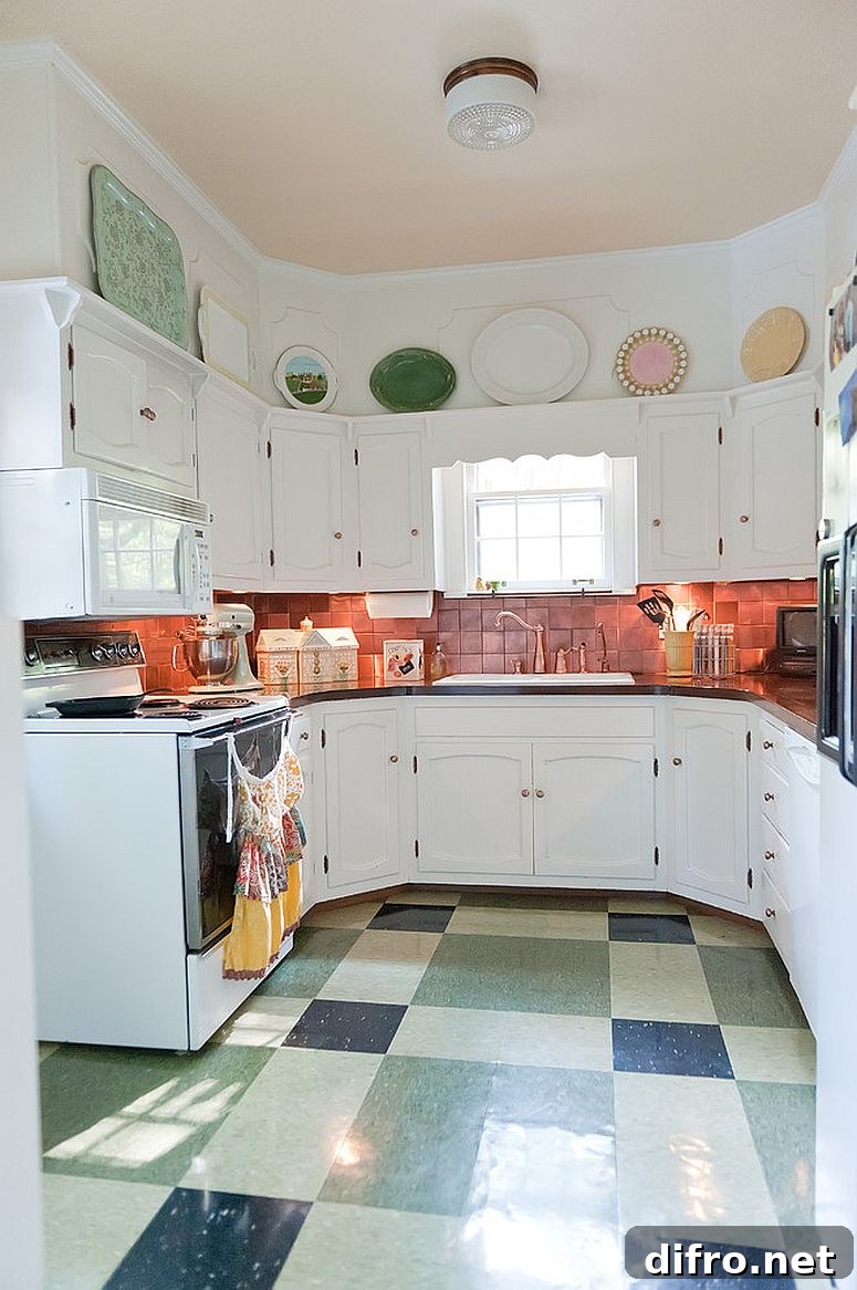 Shabby chic kitchen with space-savvy design and copper backsplash [From: Kristie Barnett, The Decorologist / Melanie G Photography]