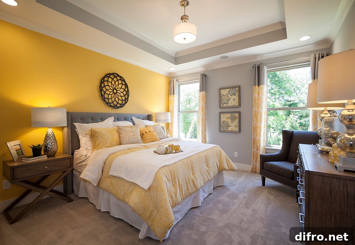 Spacious modern bedroom balancing yellow and gray
