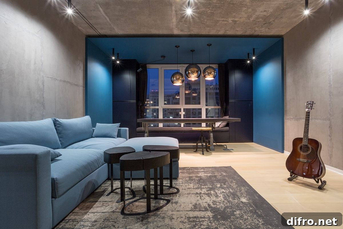 Large sectional in blue for the family area along with a charming dining space