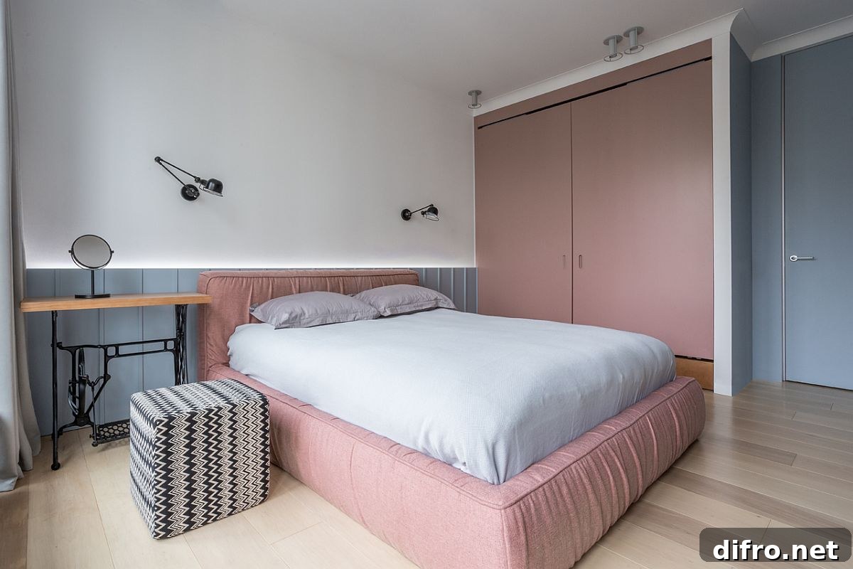 Darker shades of pastel pink are combined with blues in the bedroom seamlessly
