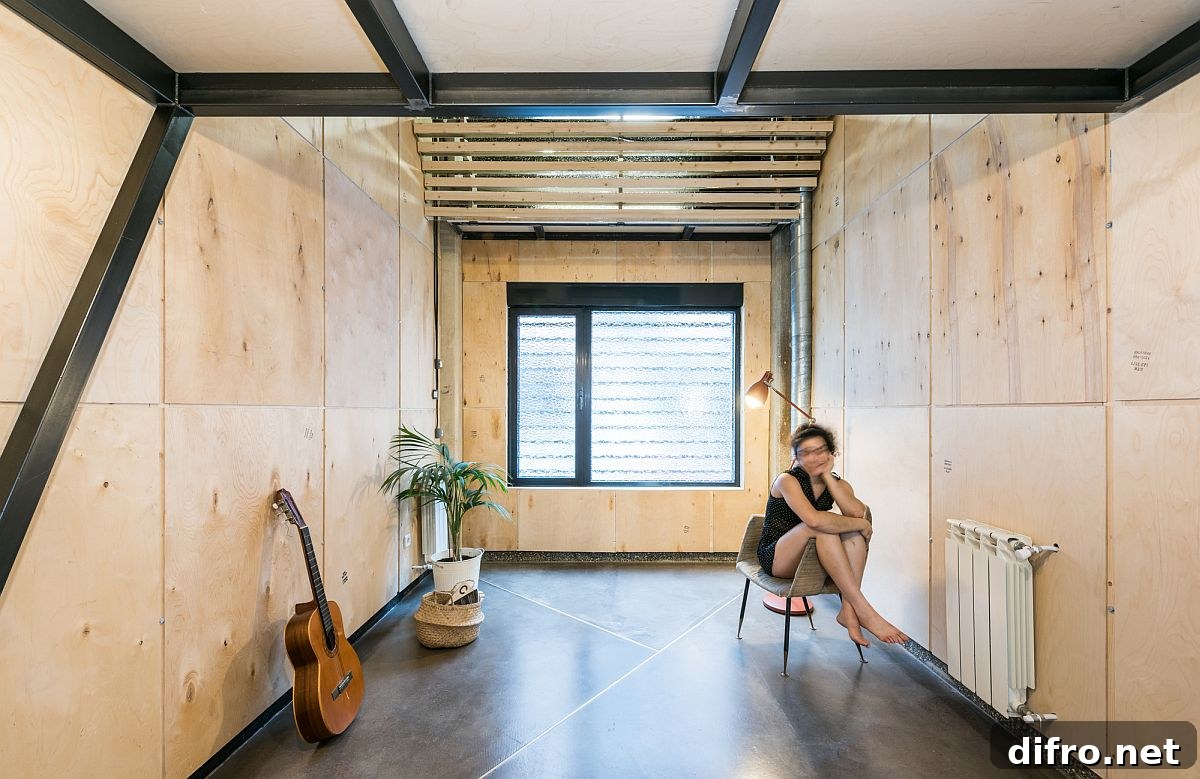 Recycled plywood on the walls adds an eco-friendly touch