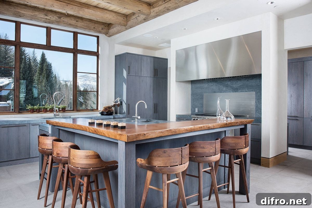 White and gray kitchen with wood breakfast bar and stools