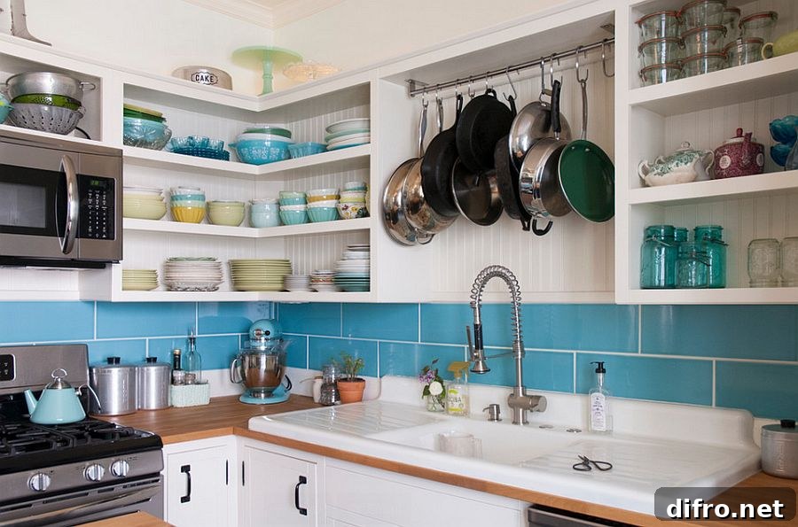 Mix of open shelves and closed cabinets in a small modern kitchen