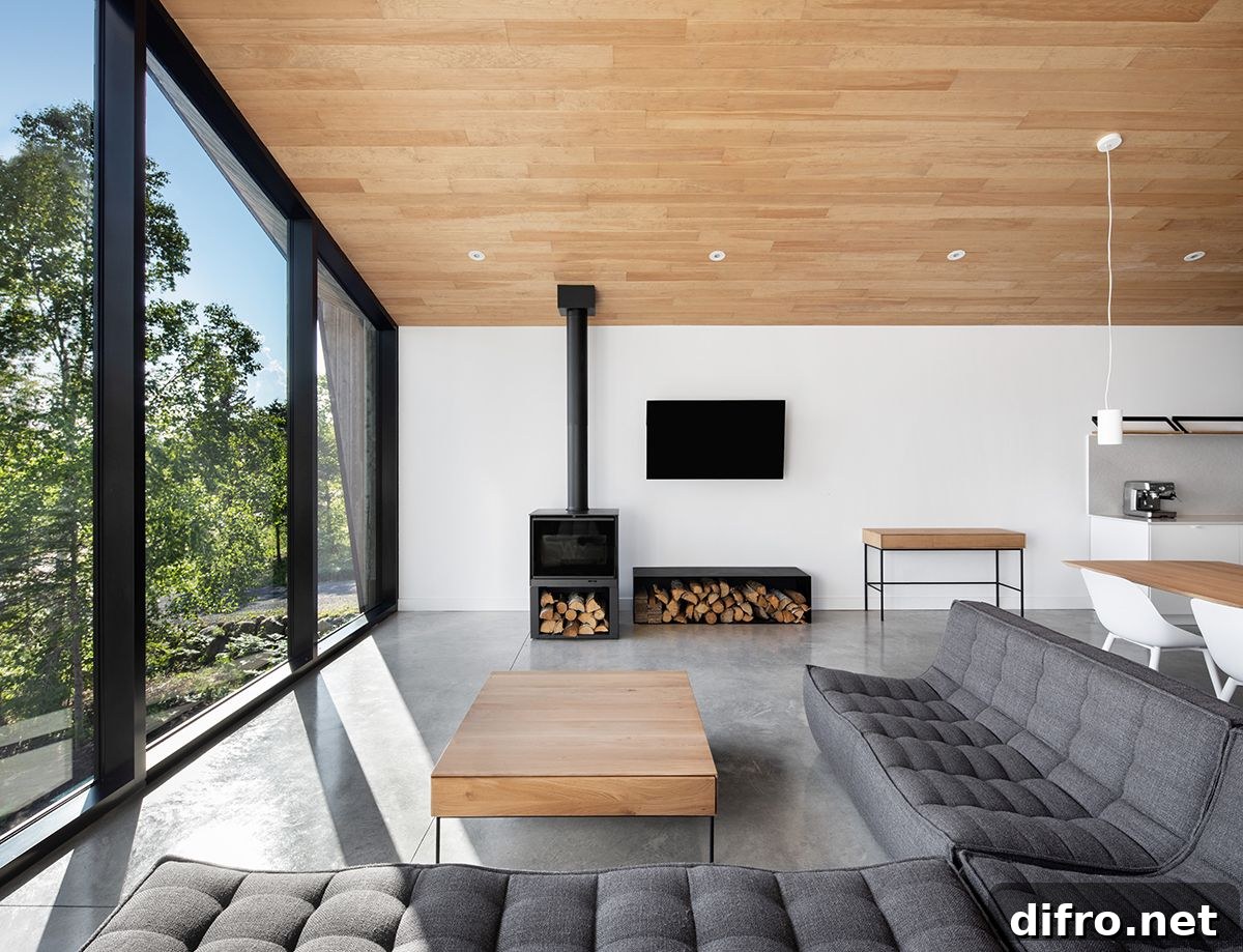 Cozy gray sectional and fireplace in the living area