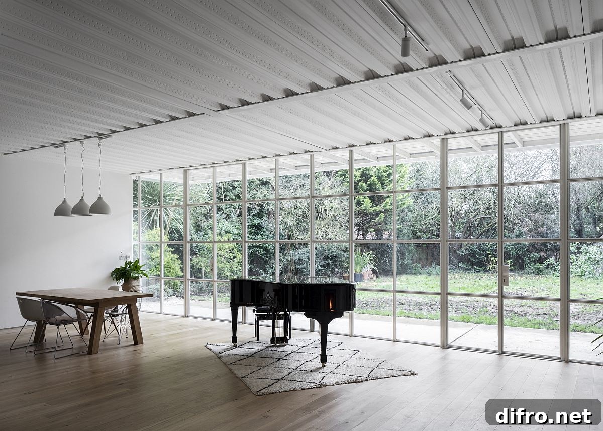 Framed glass walls bring the outdoors inside while illuminating the home