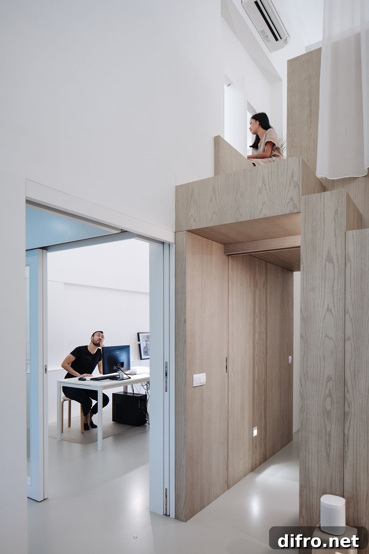 Creating a link between the loft level bedroom and the office space of the apartment