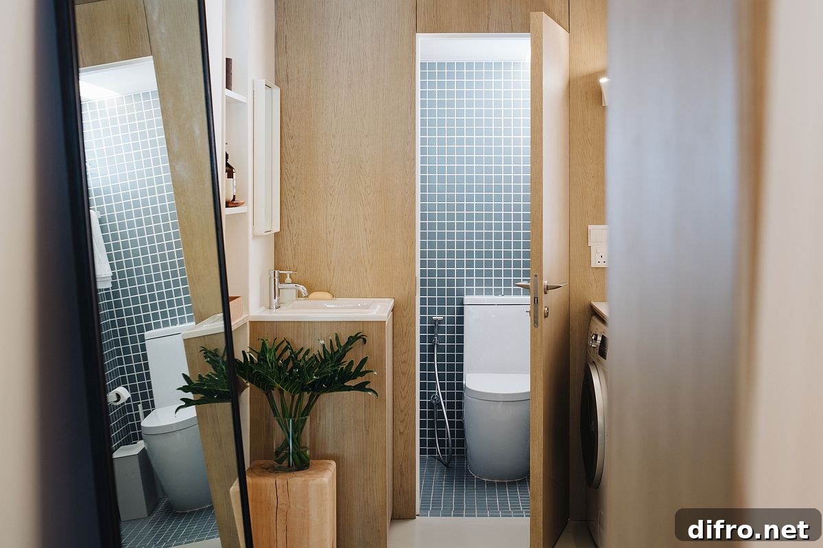 Custom tiles add pattern to the bathroom in wood and white