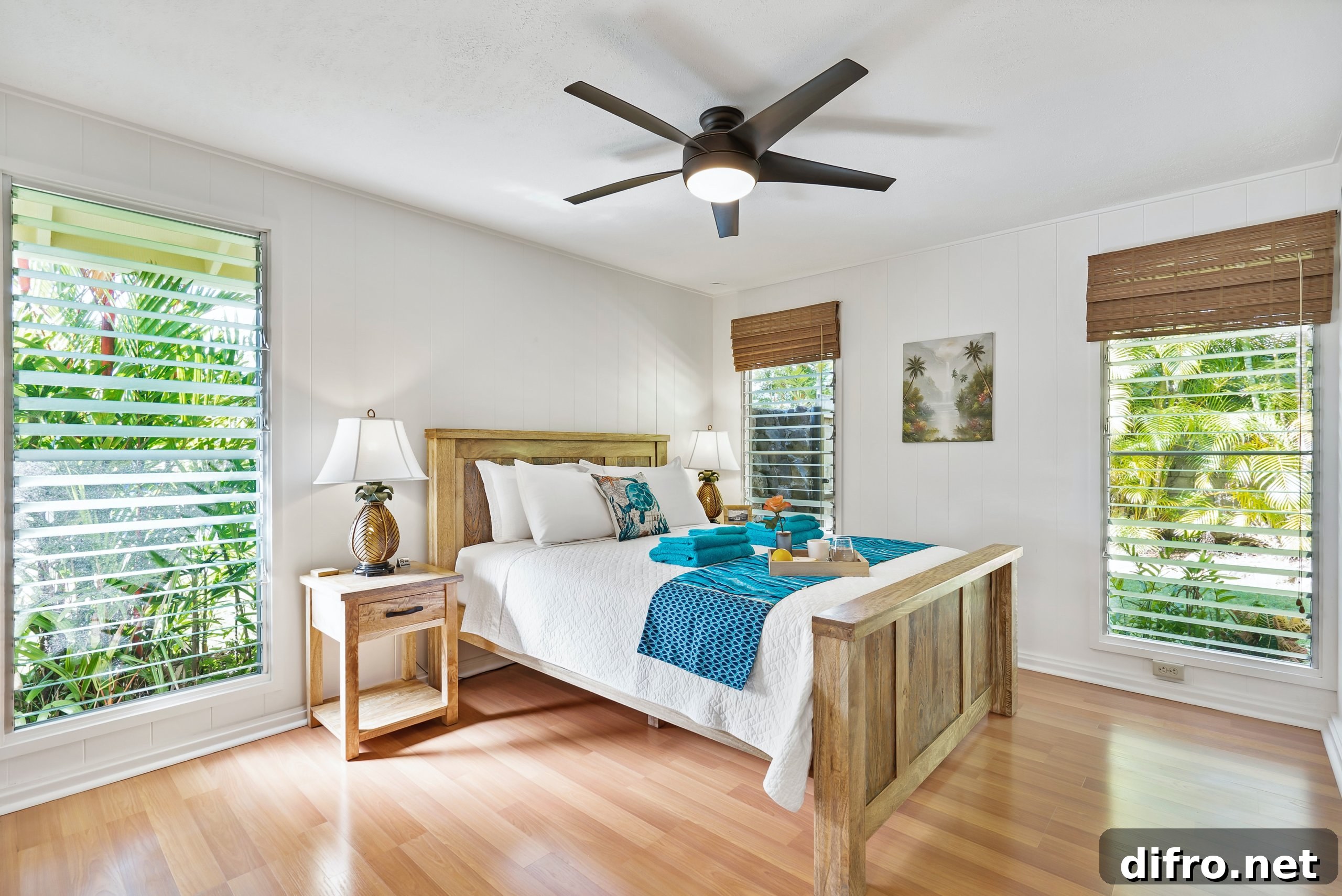 farmhouse style bedroom with shutters and bamboo window covering