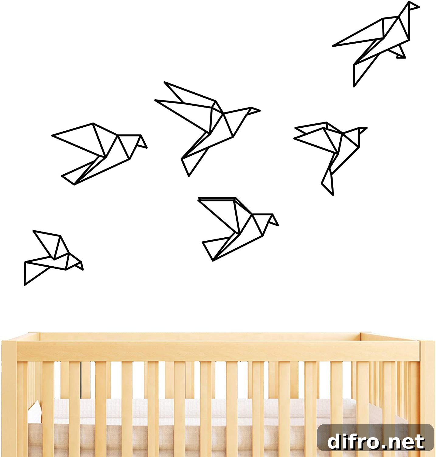 Black bird outline on a white wall