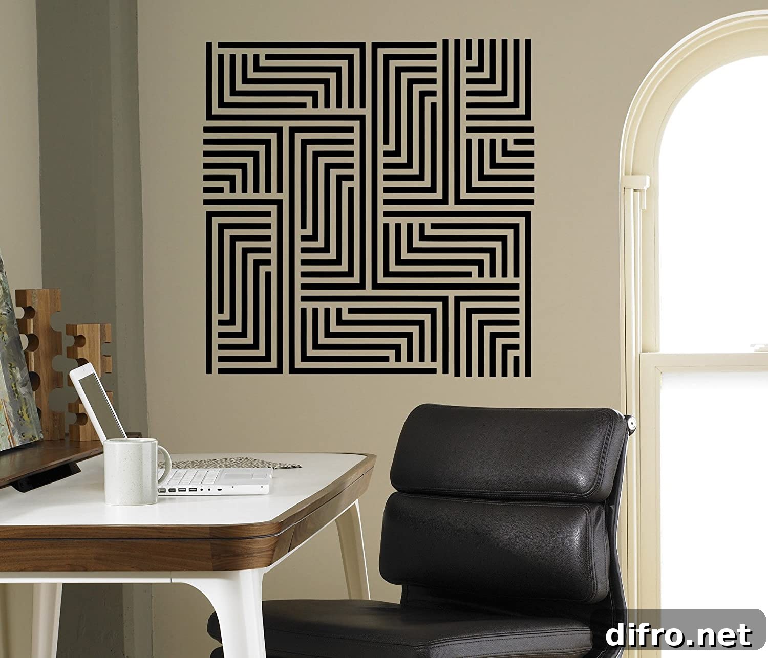 White laptop on a desk with black chair