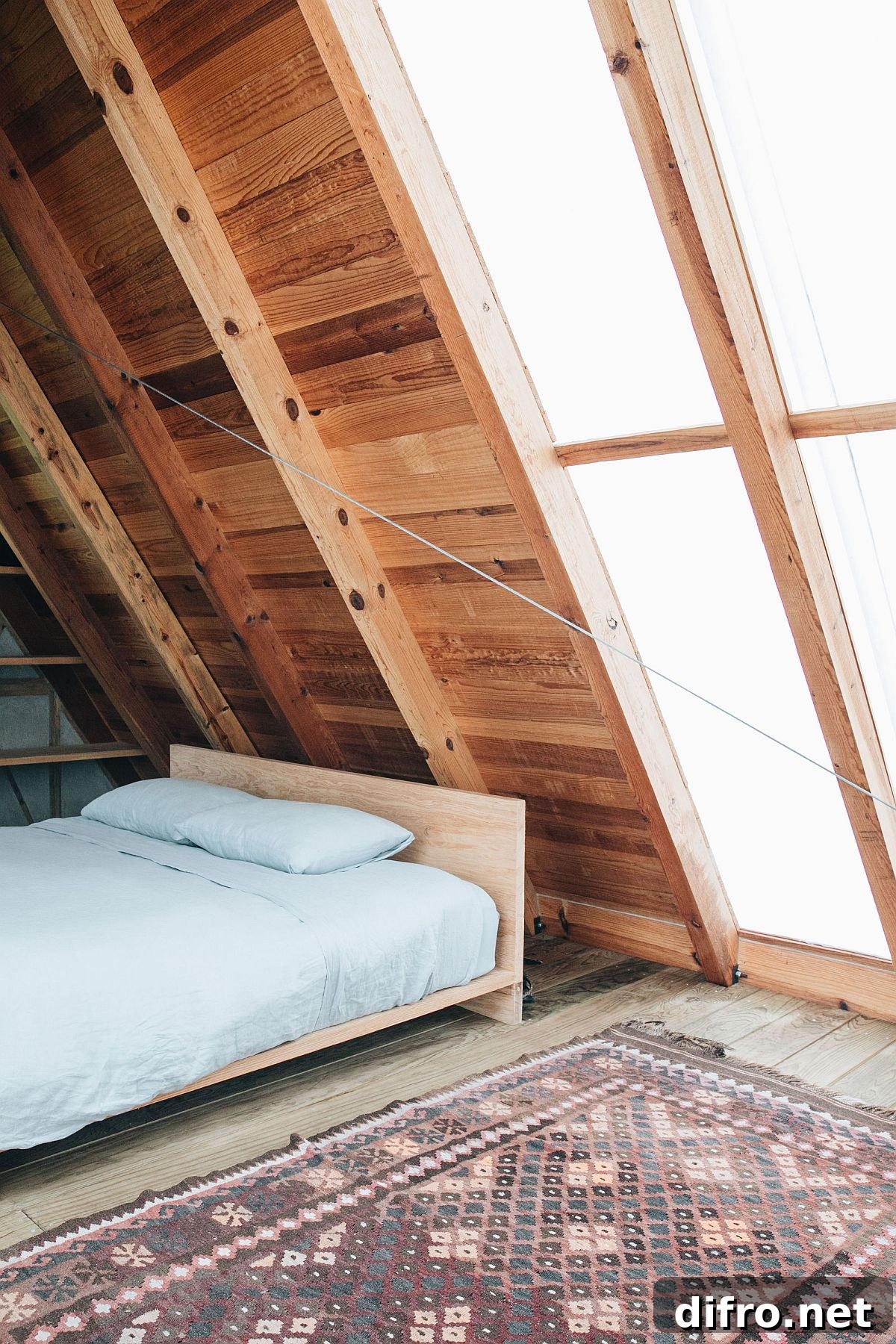 Loft level bedroom with natural light