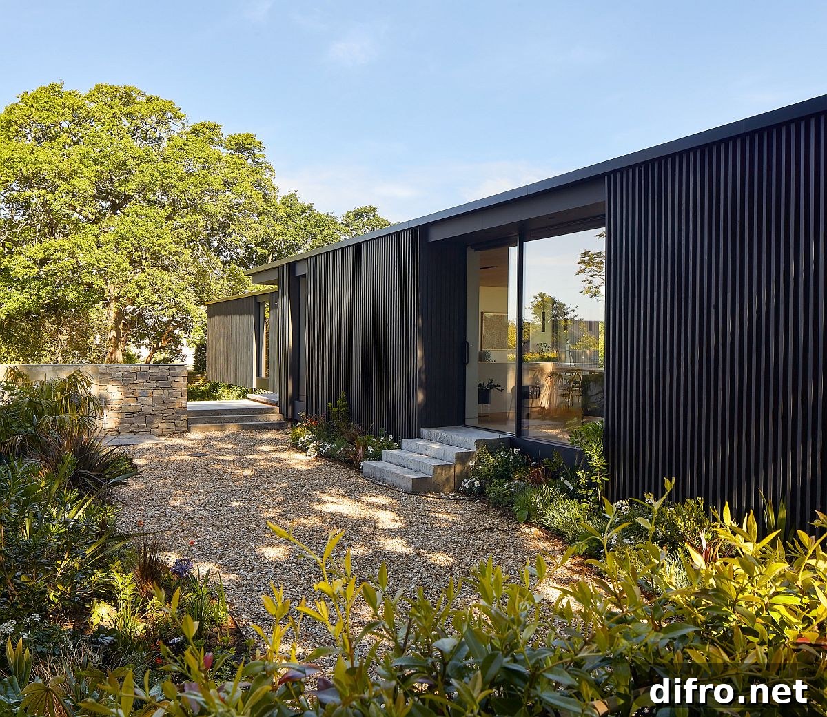 Dark exterior that blends with landscape at dusk