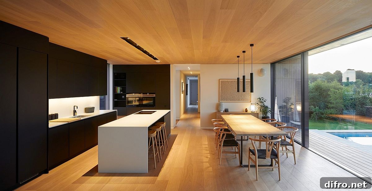 Wooden ceiling and floor contrasting with a dark kitchen backdrop