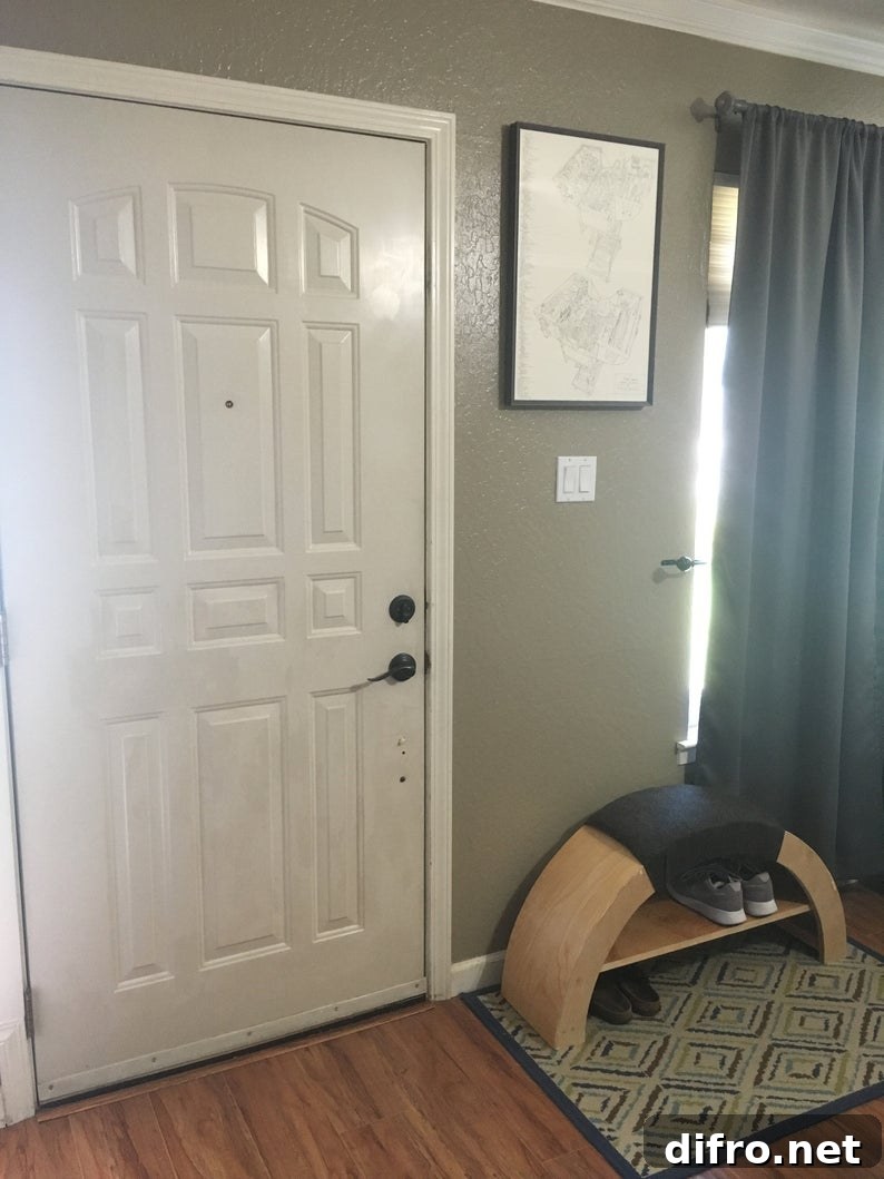 Arched bench beside a door