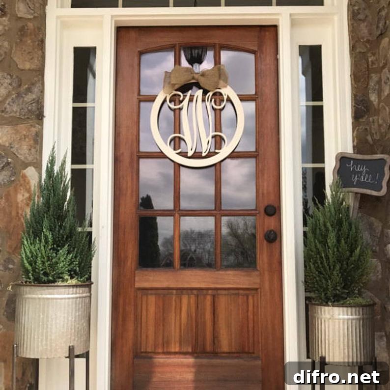Wooden door with glass panels and monogram door hanger