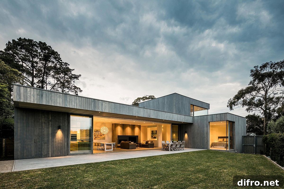 Open plan living area of the home finds its way on to the deck outside in a seamless manner