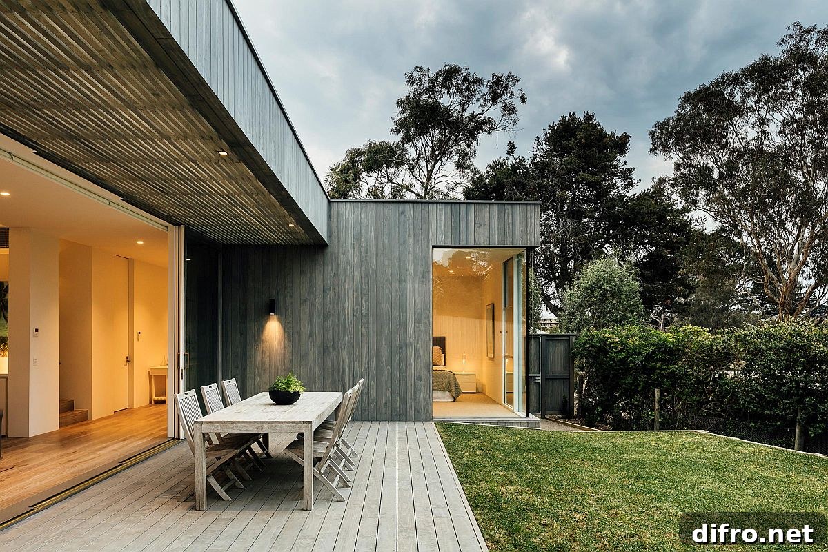 Charming wooden deck with al fresco dining extends the living area outdoors
