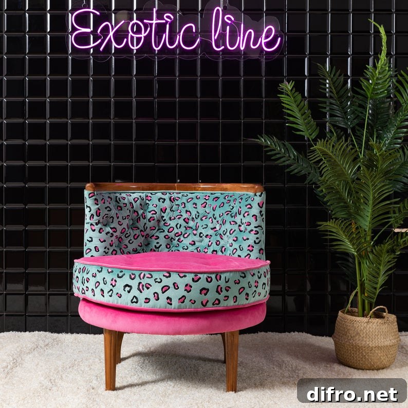 Leopard chair in light blue and pink beside a tall plant