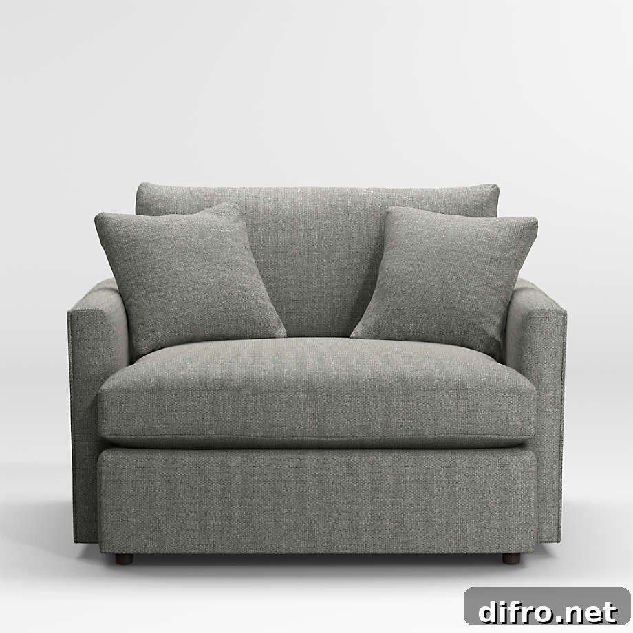 Grey lounge chair with two grey cushions