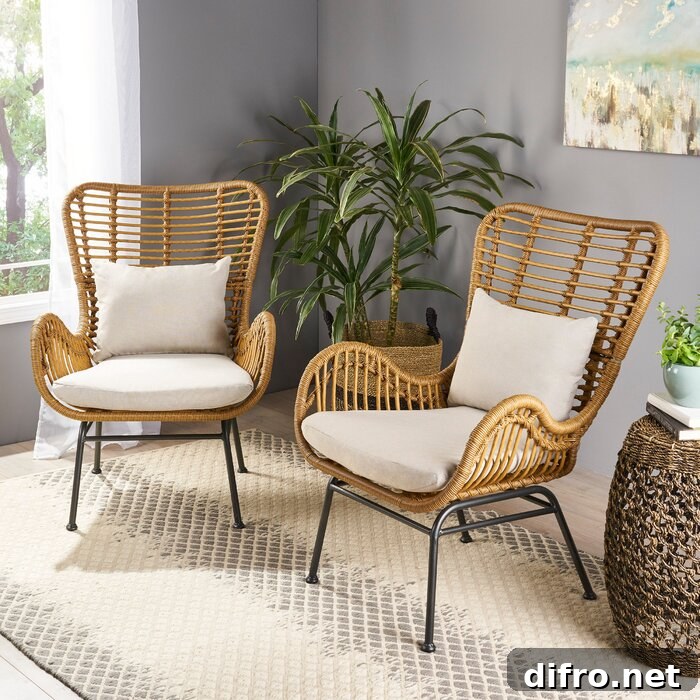 Two brown chairs with carpet underneath