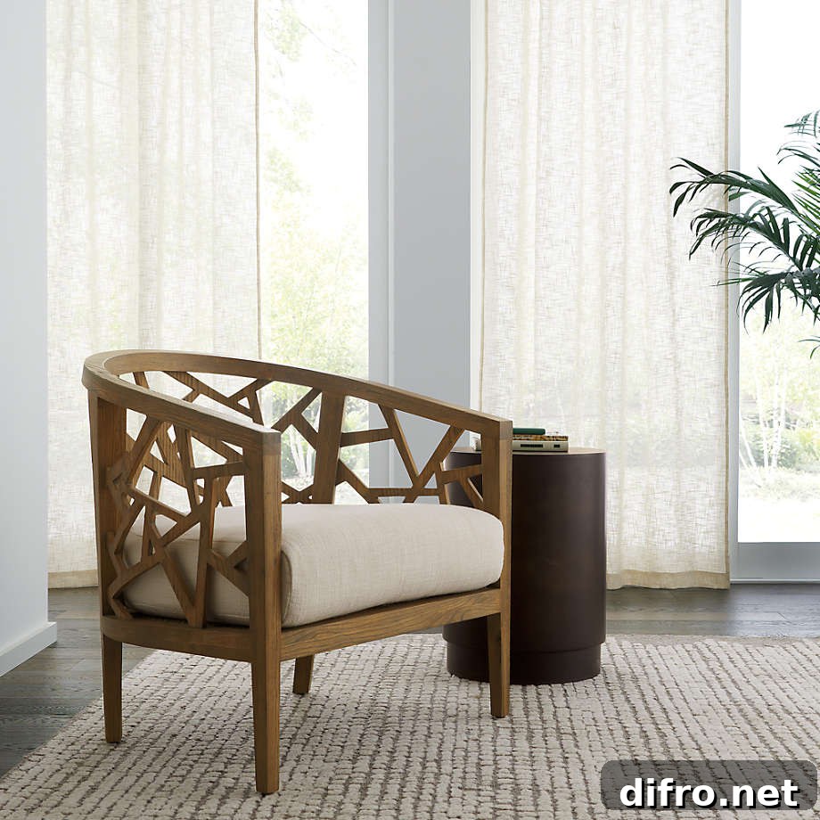 Wood armchair with geometric design and fabric cushion