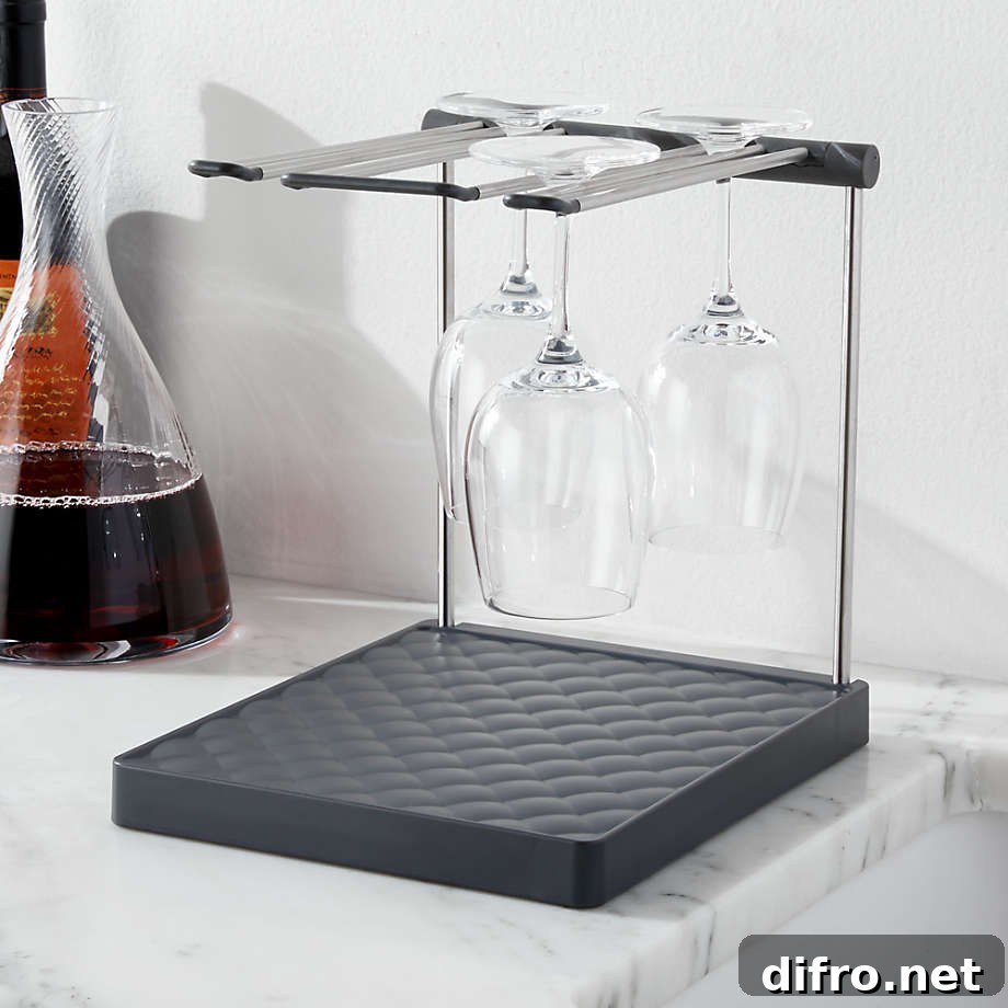 Wine glass drying rack beside a half-full wine flask
