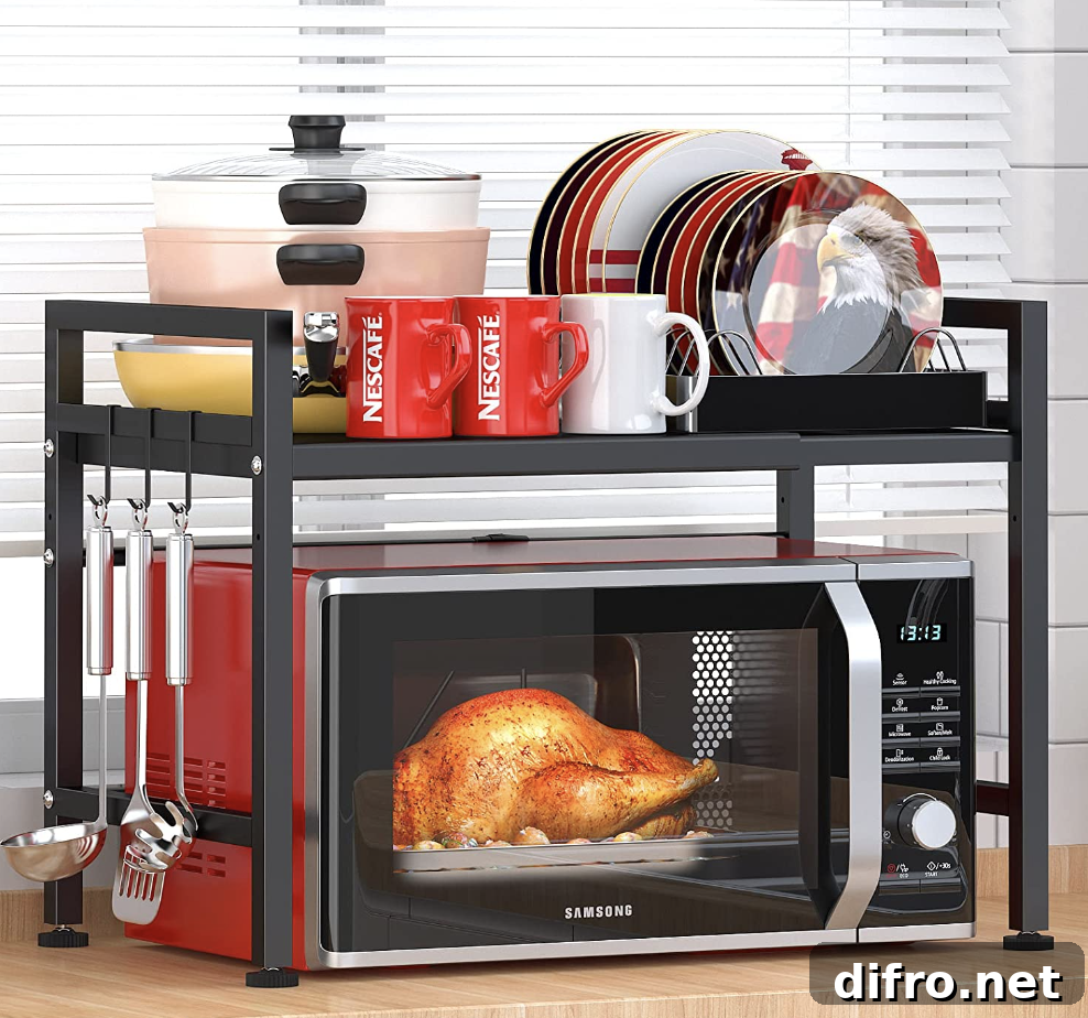 red toaster oven with wire rack over top holding kitchen items