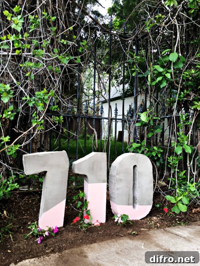 giant cement house numbers painted and in garden