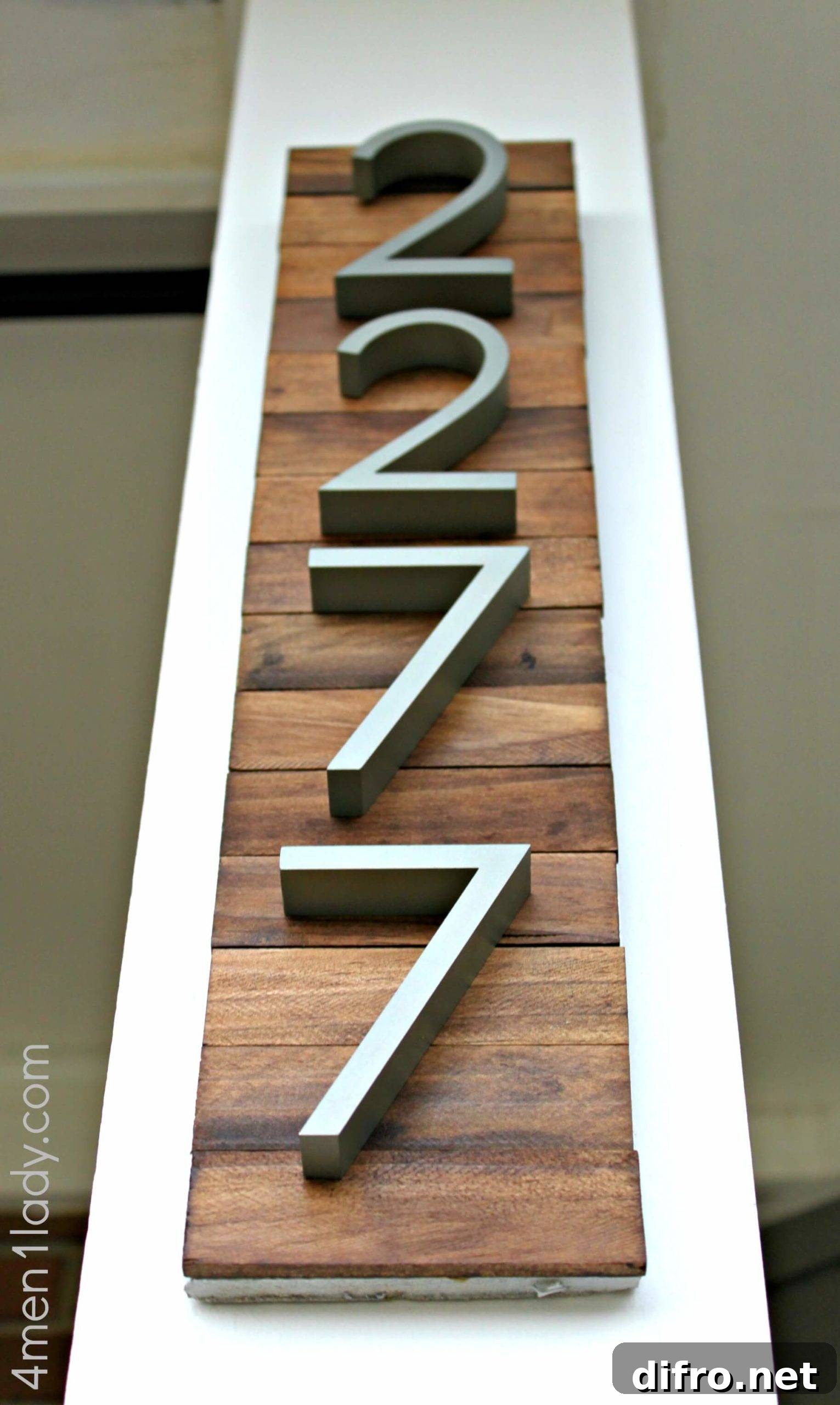 vertical wood sign with house numbers close up
