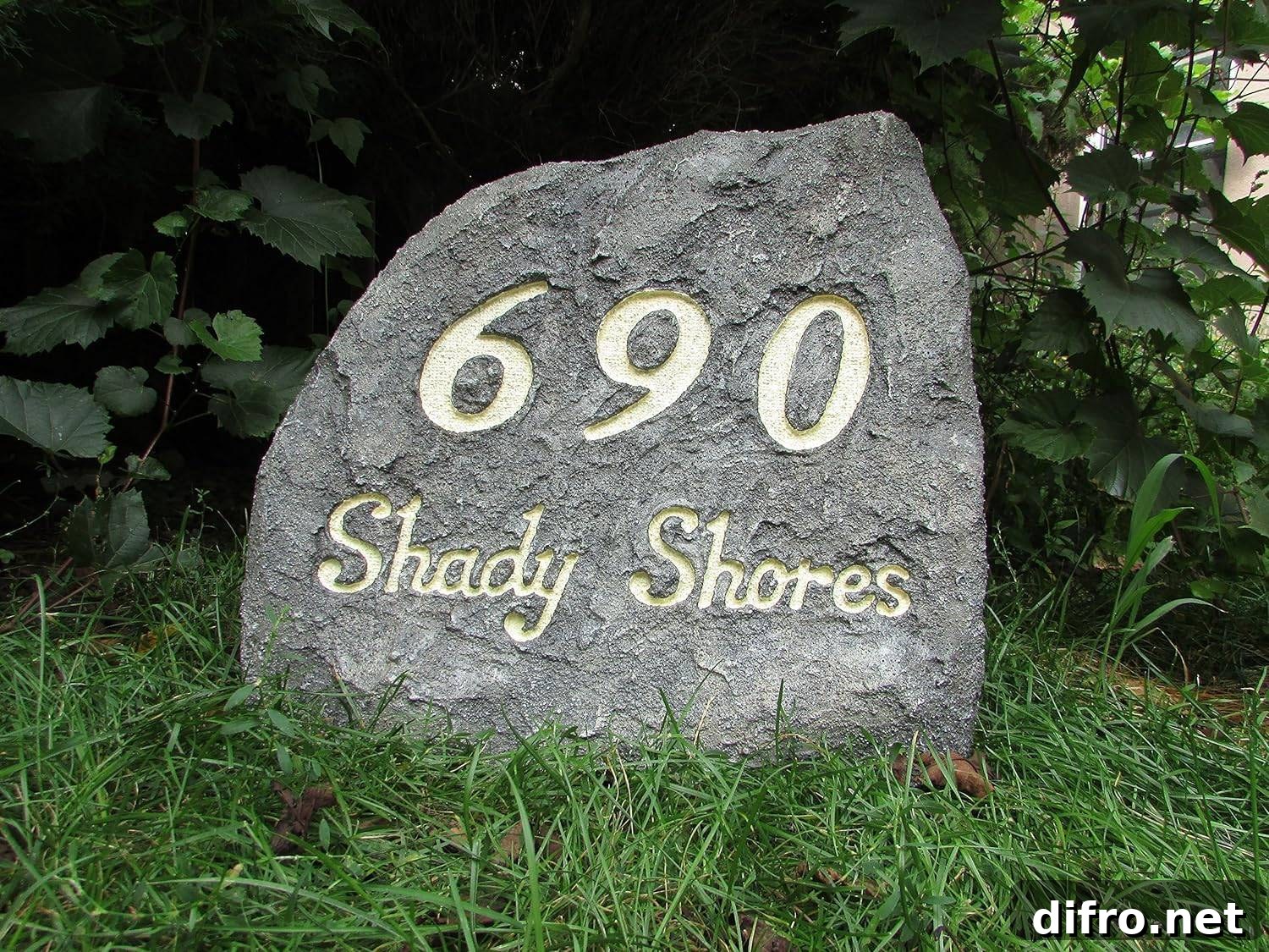 Stone with a house number on it.