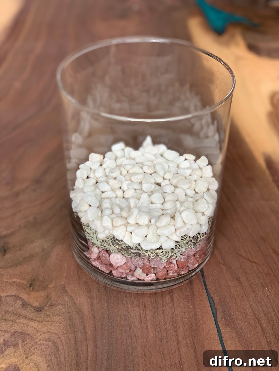 Decorative white river stones in vase