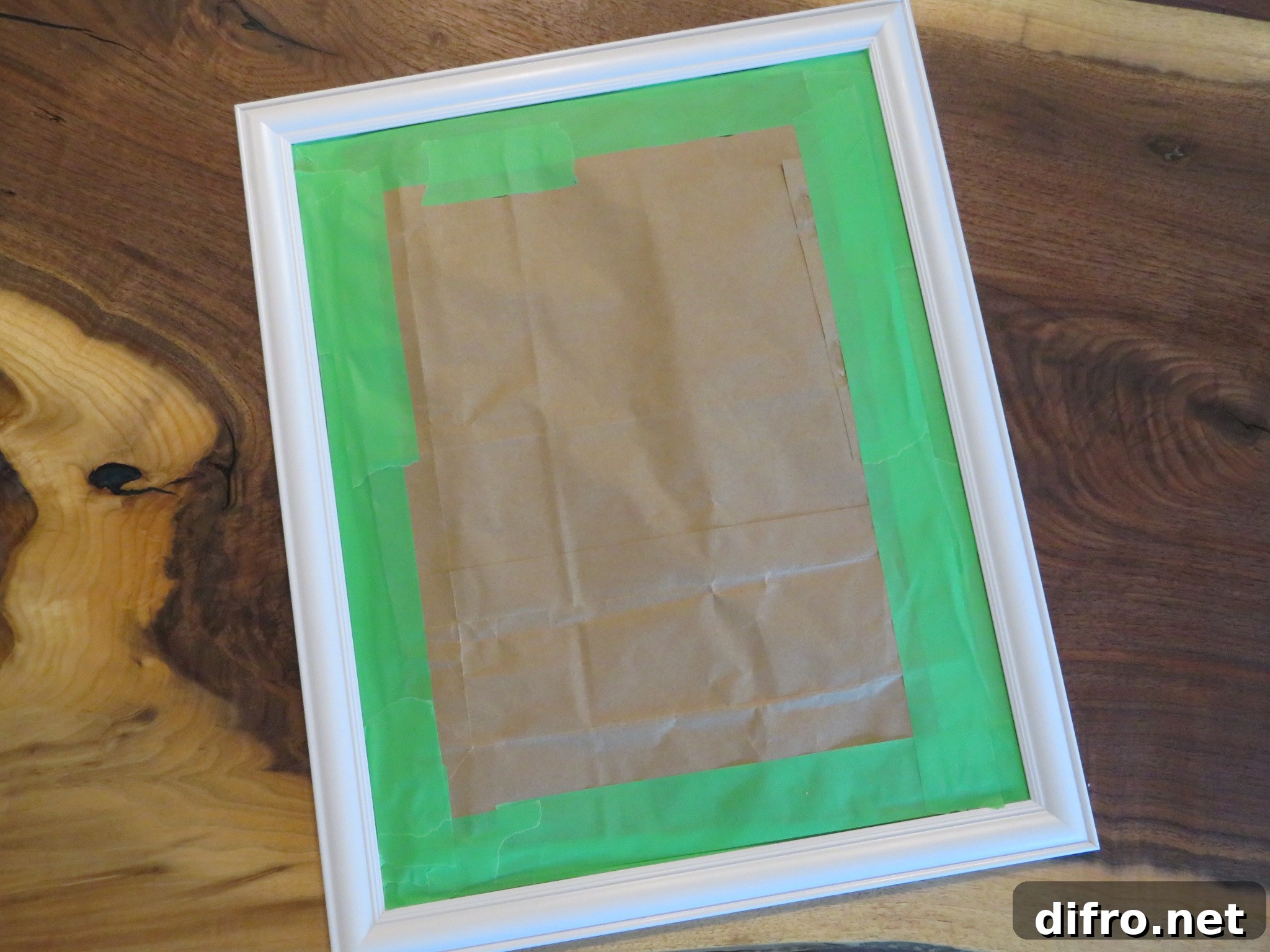 White mirror frame prepared for spray paing