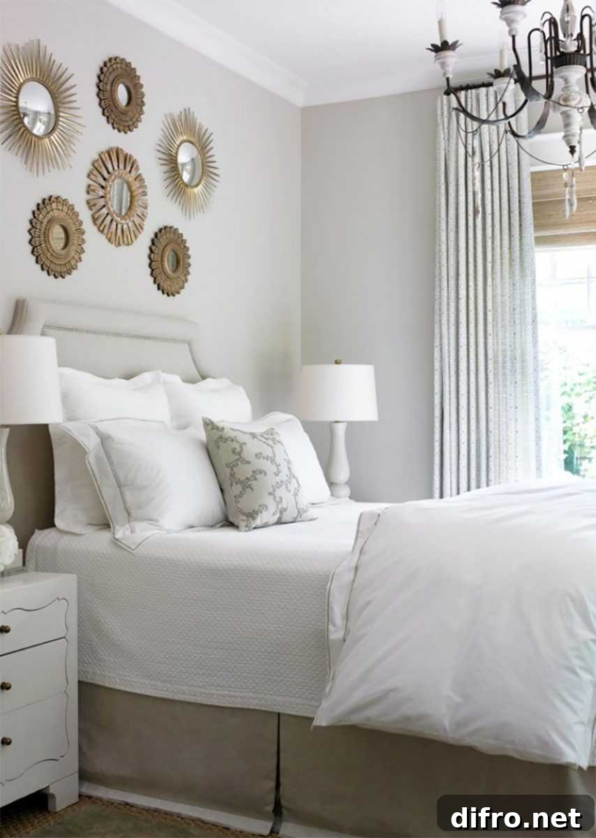 variety of sunburst mirrors mounted above headboard