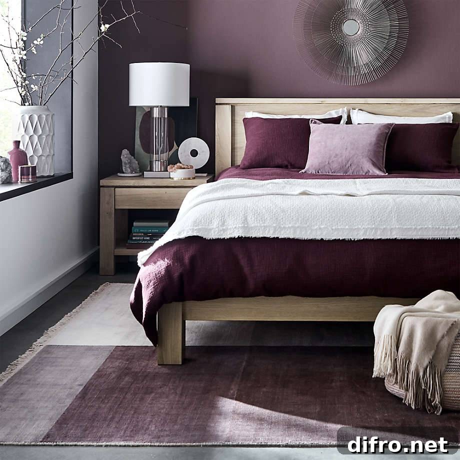 purple bedroom walls and linen on wooden bed frame