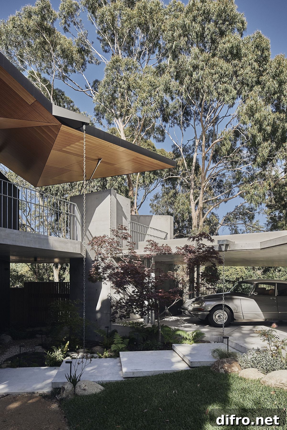 Green outdoors and entry of the unique Australian home