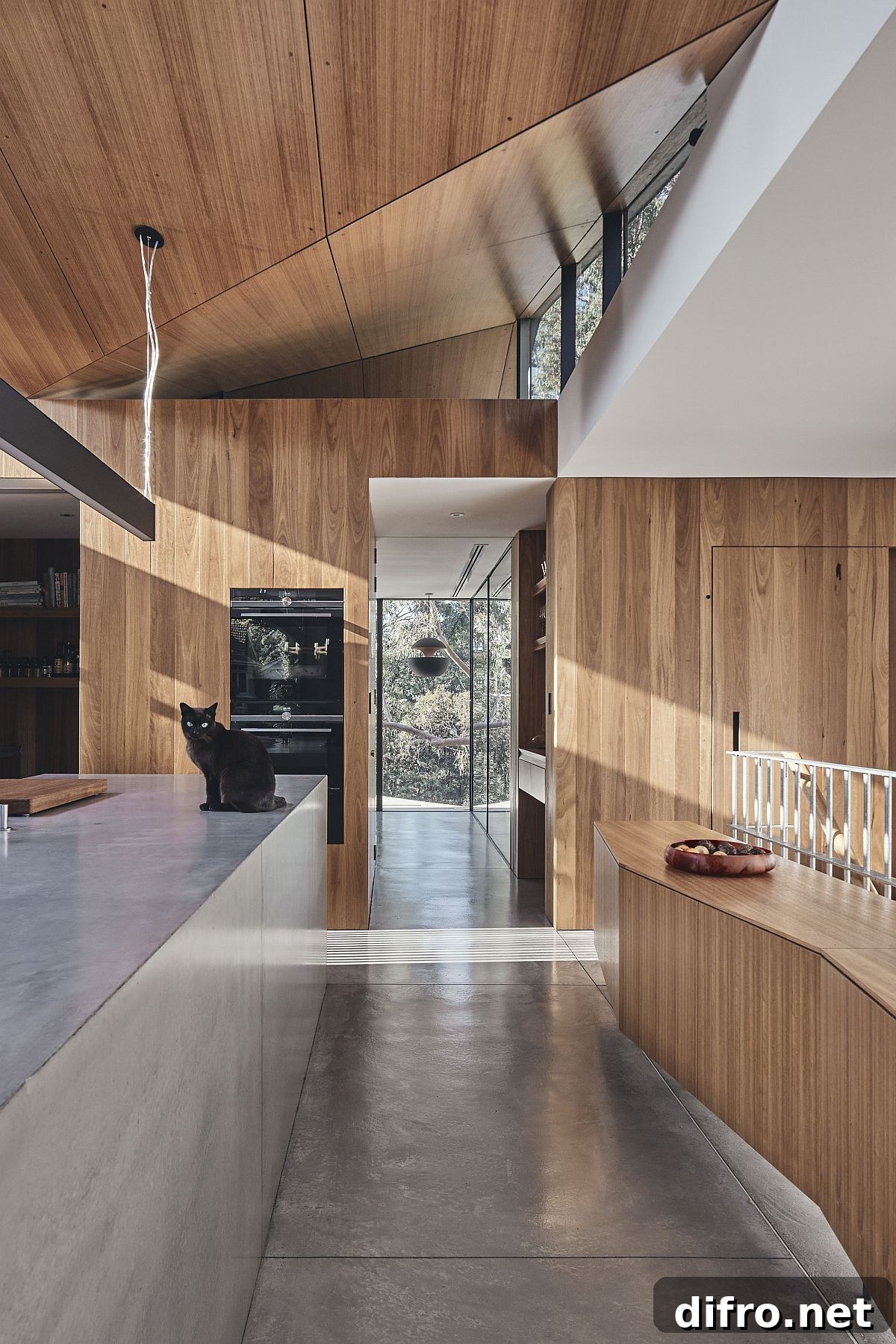 Spacious and well-lit kitchen with wood and white cabinetry