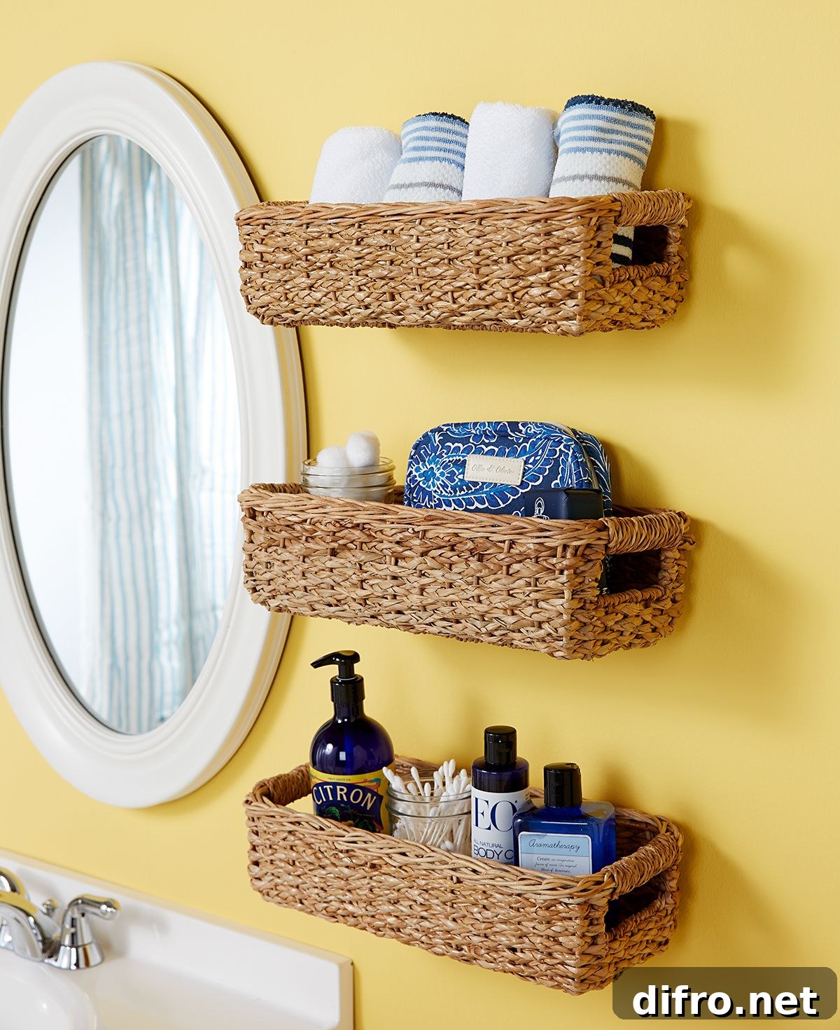 Three wicker baskets on the wall full of things