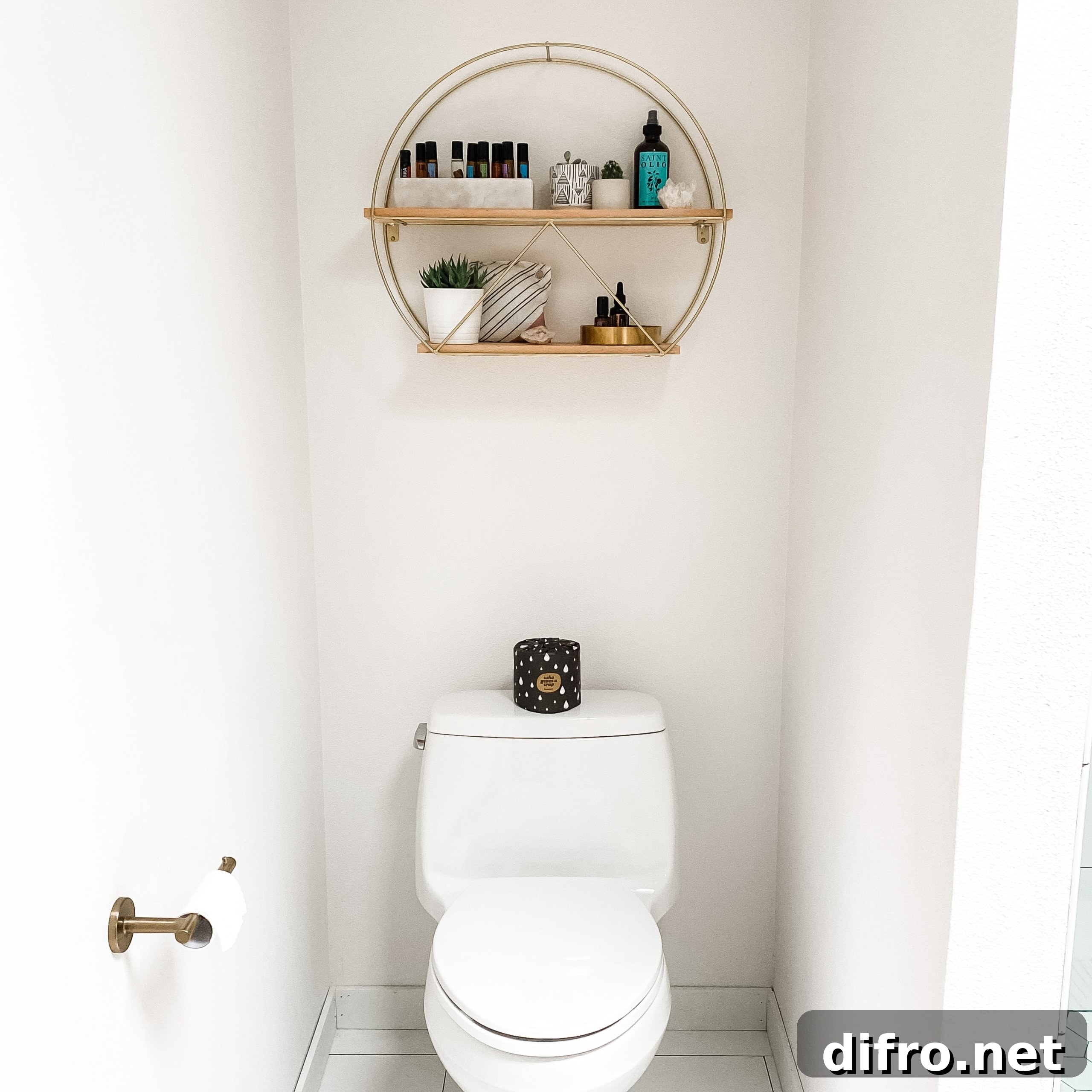 White toilet with black candle on top