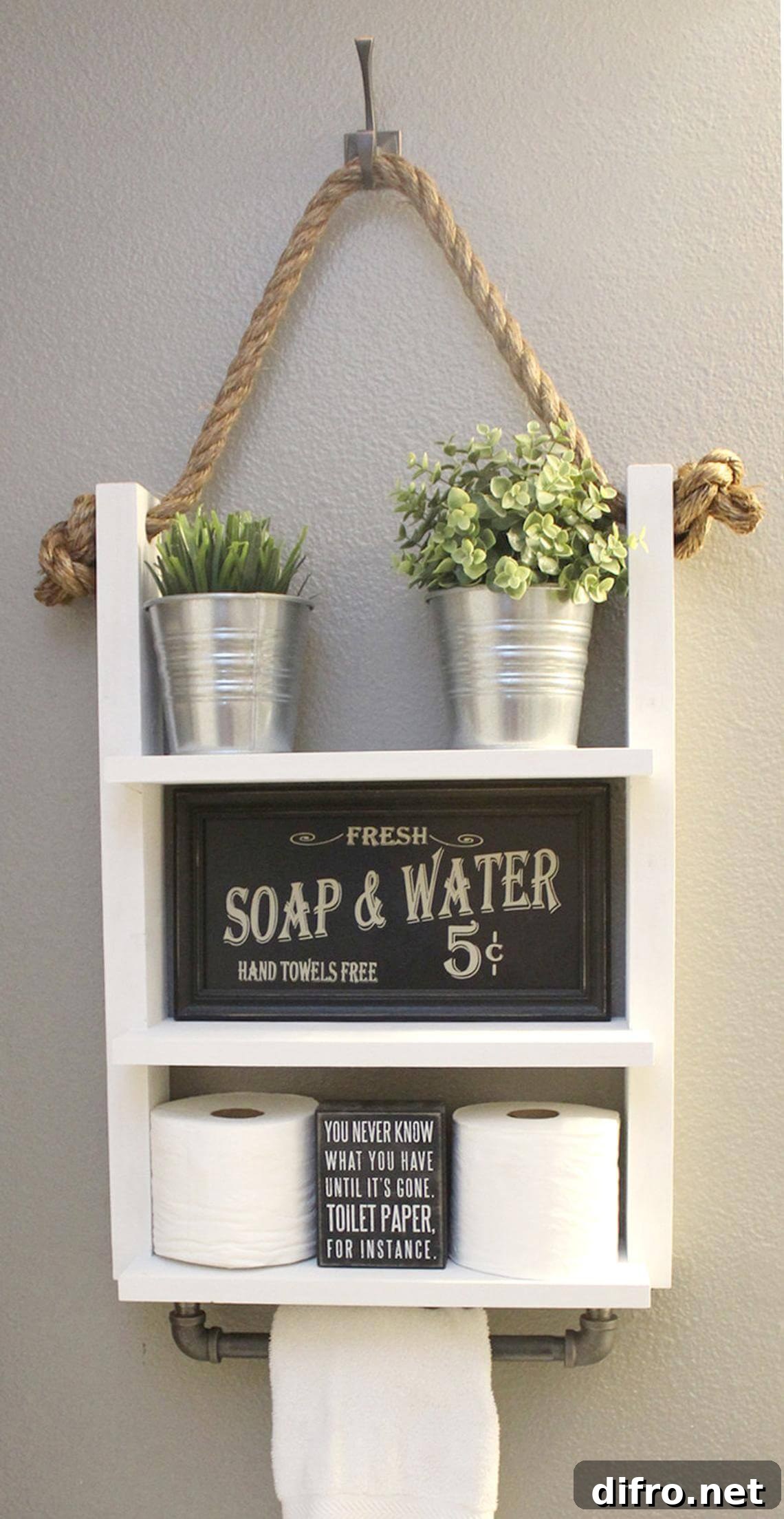 white three tiered hanging by rope shelf for over the toiled storage