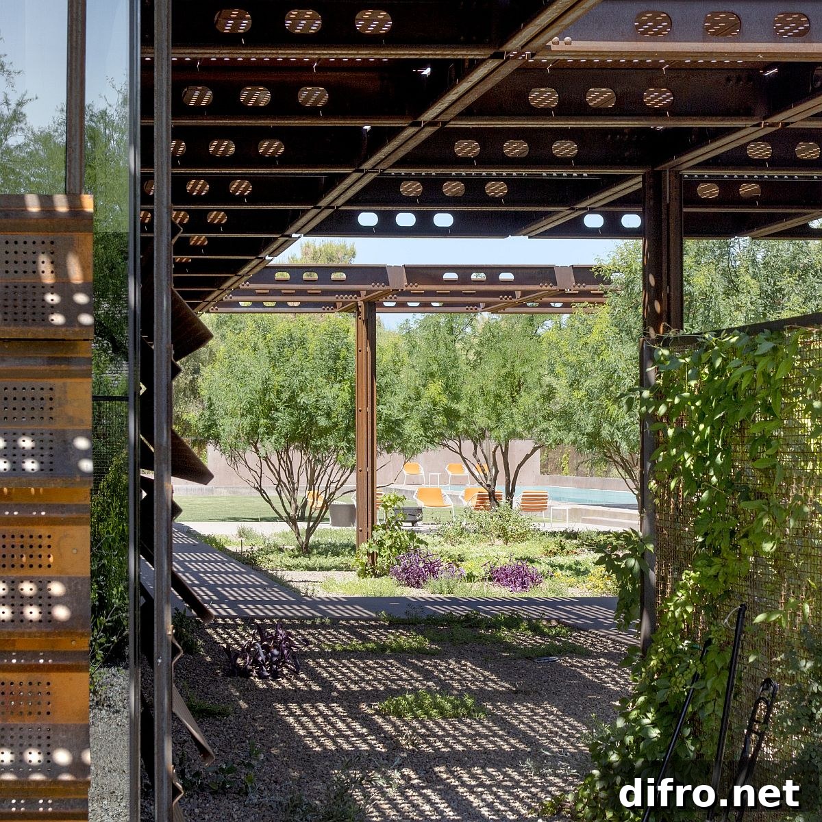 Custom shade coupled with the Corten steel framework bring filtered light indoors