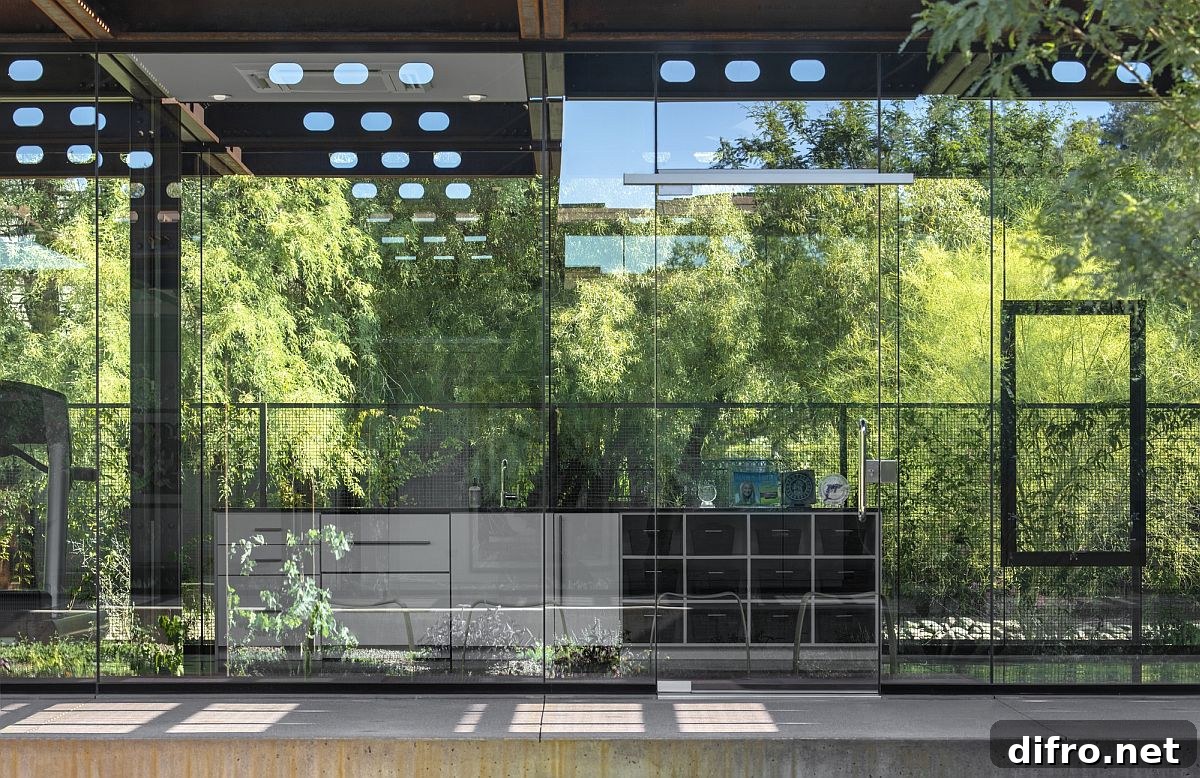 Glazed glass walls connect the interior with the world outside