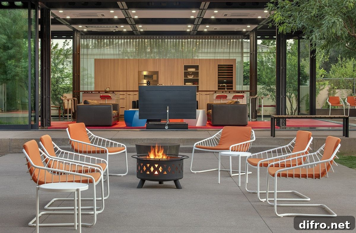 Colorful chairs coupled with a fire pit for a cozy outdoor lounge