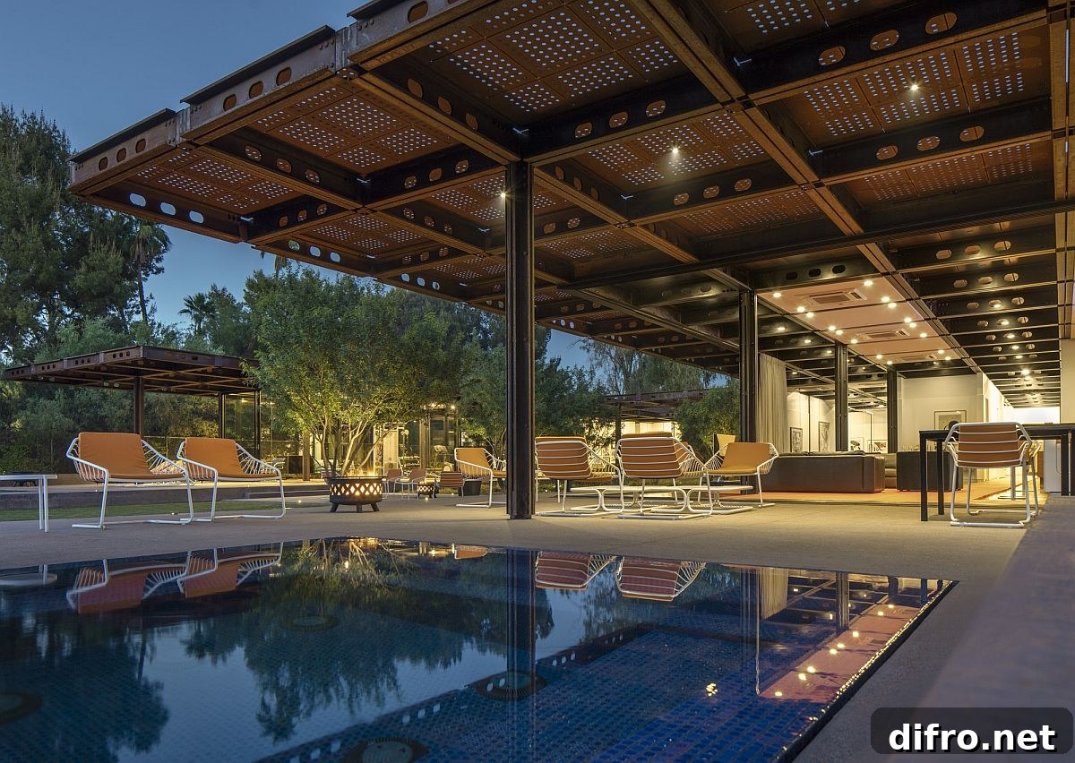 Perforated Corten sheets around the pool ensure that there is ample shade next to the pool