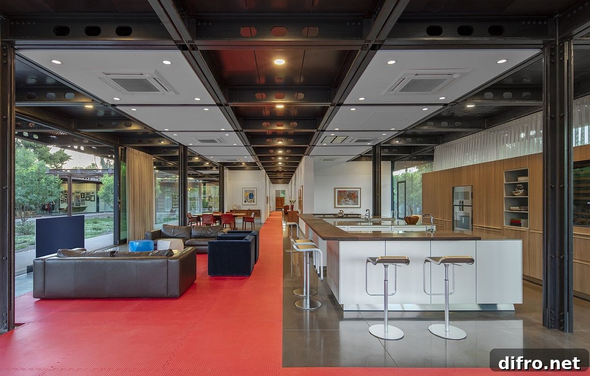 Polished concrete floor covered using bright, non-slip rugs all over the living room