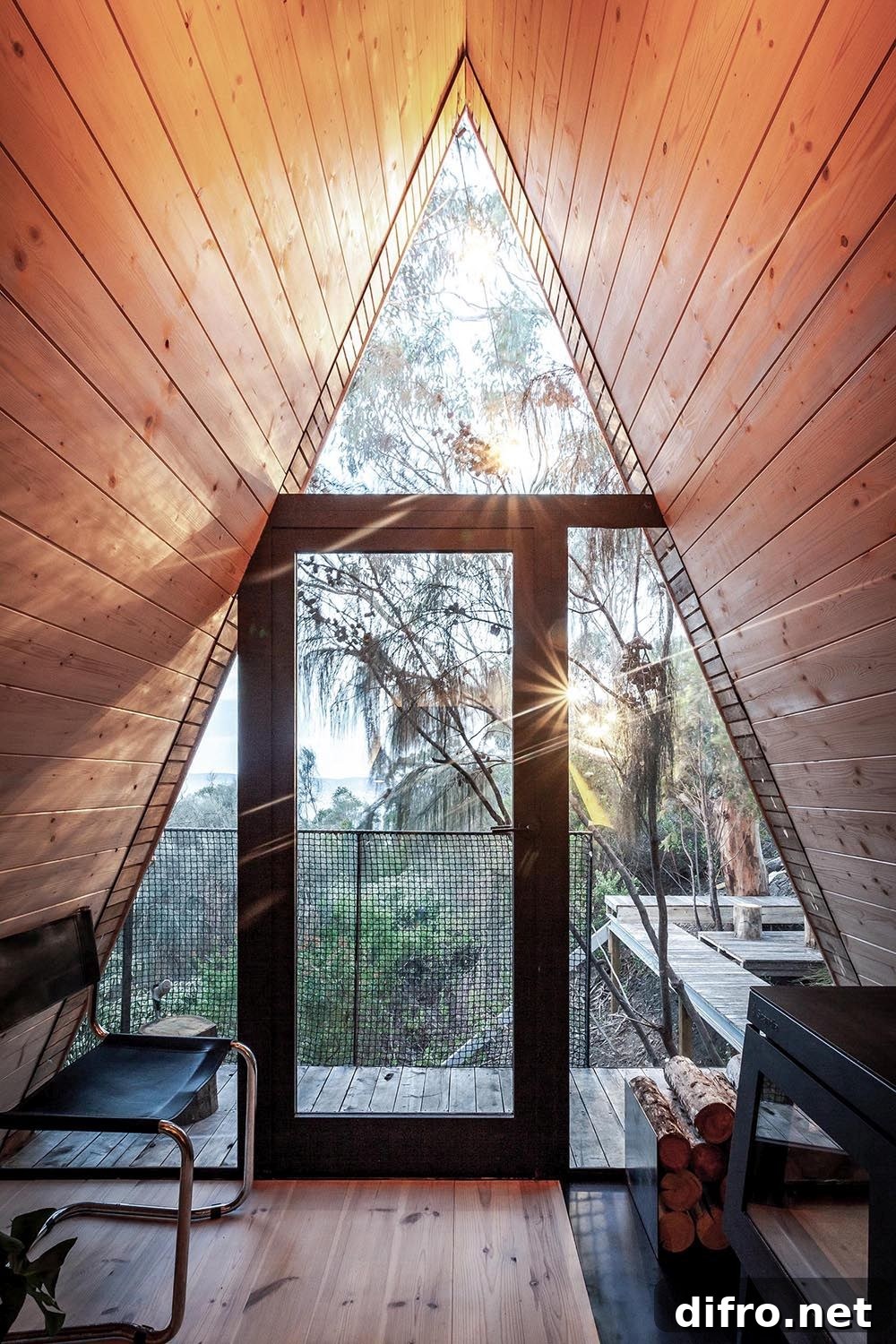 Door and windows of the A-frame house from the inside.