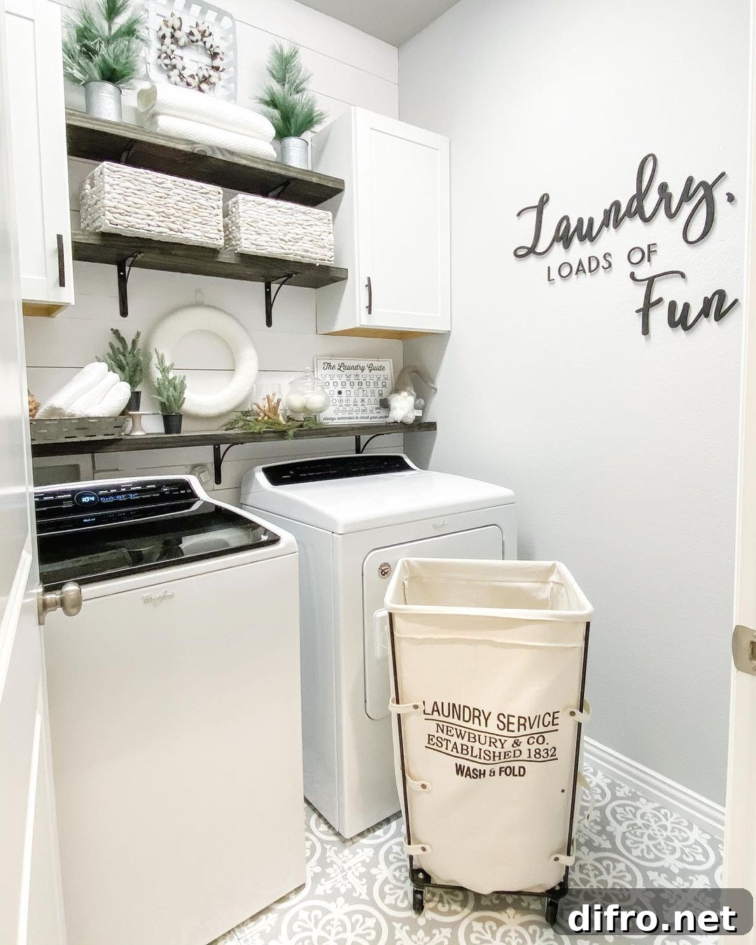 Wall decal and hamper inside laundry room