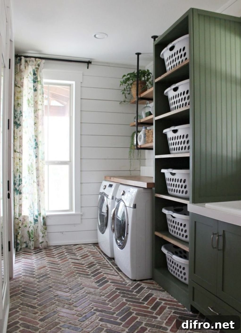 Laundry room with herringbone flooring