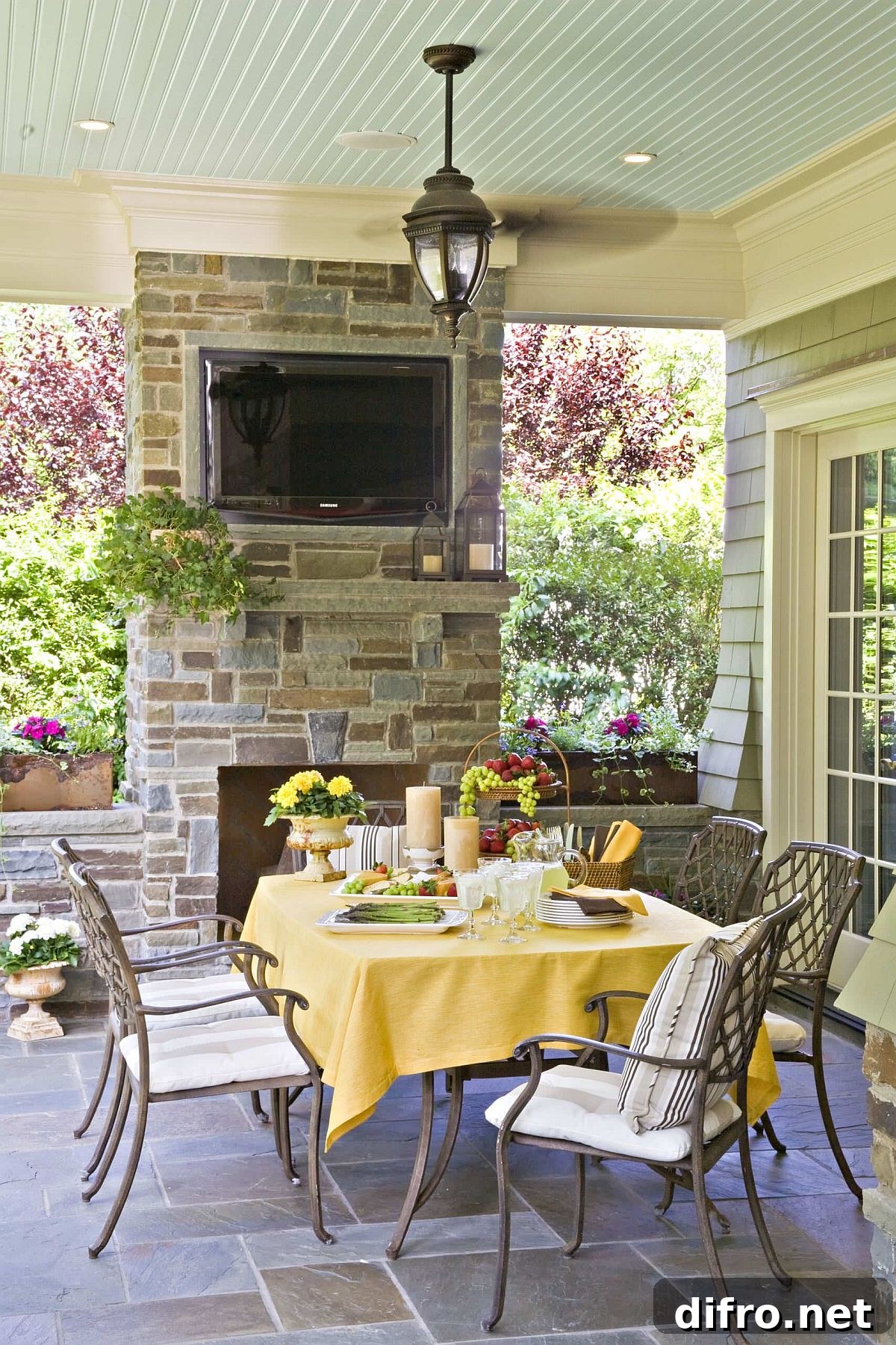 Yellow tablecloth and accents on an outdoor dining table