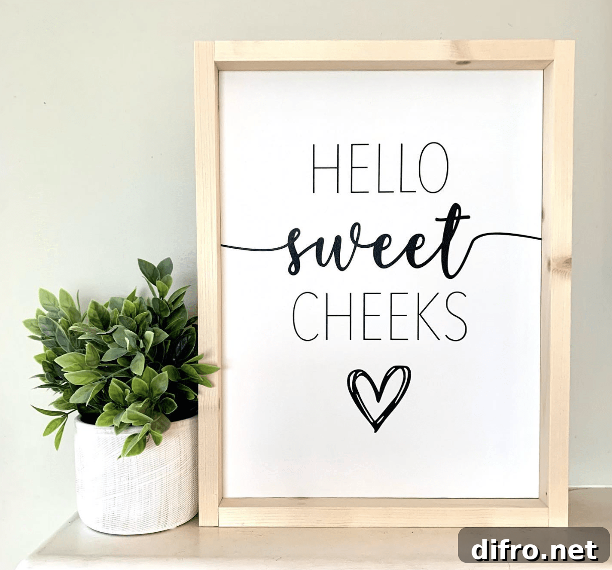 hello sweet cheeks framed wood sign with white background greenery