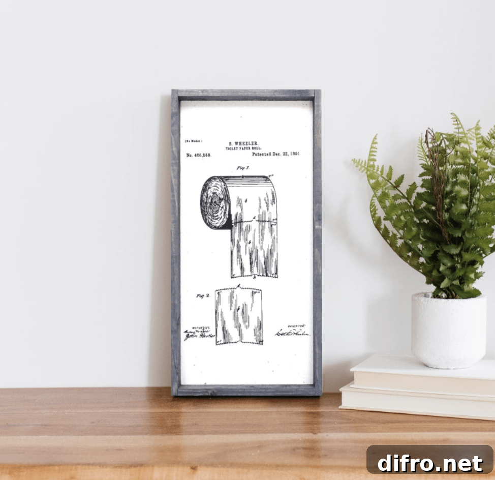 toilet paper patent sign wood frame grey white background greenery